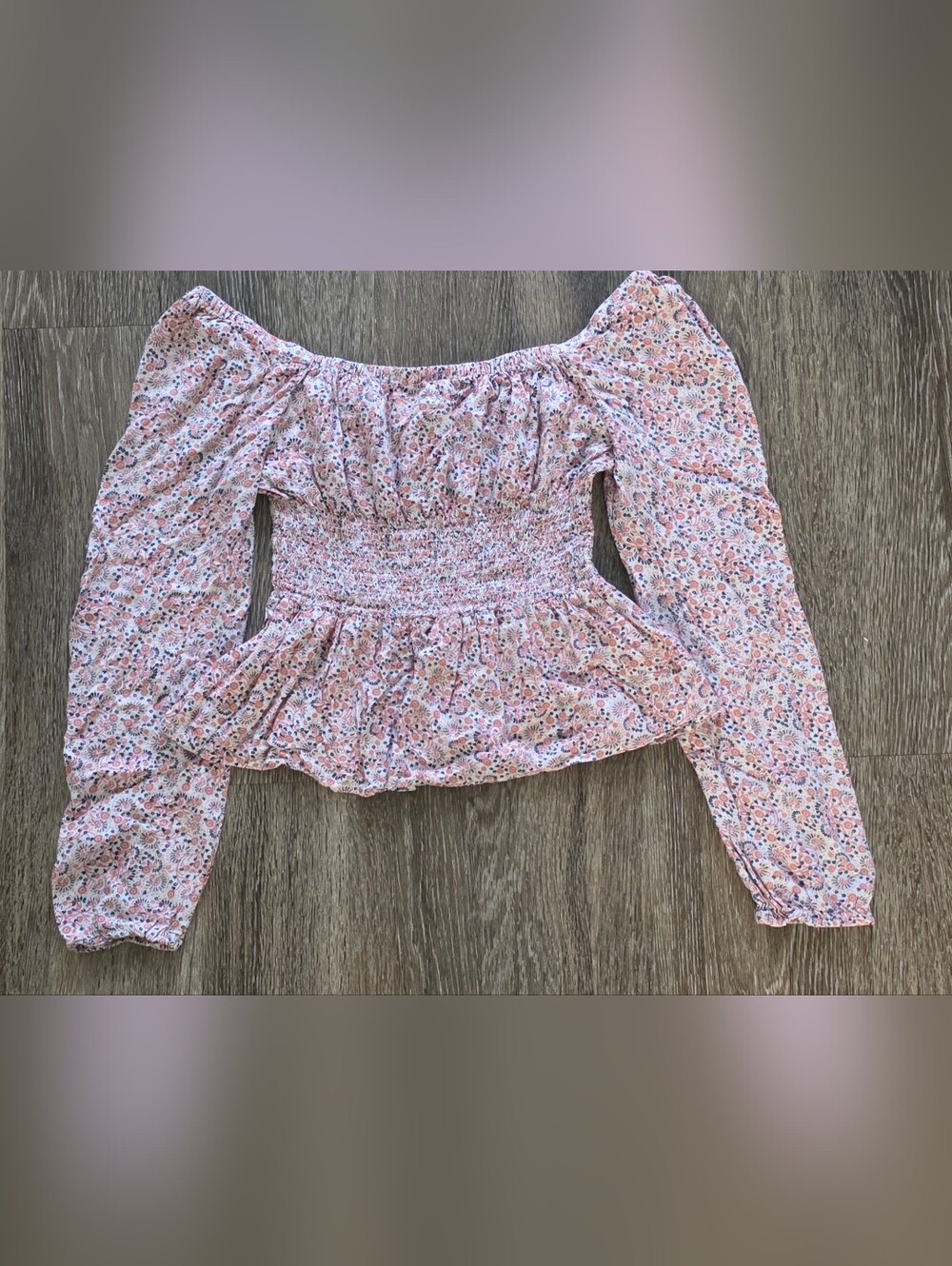 Peasant style blouse with mini floral print and peplum cut of the Japna Size XS